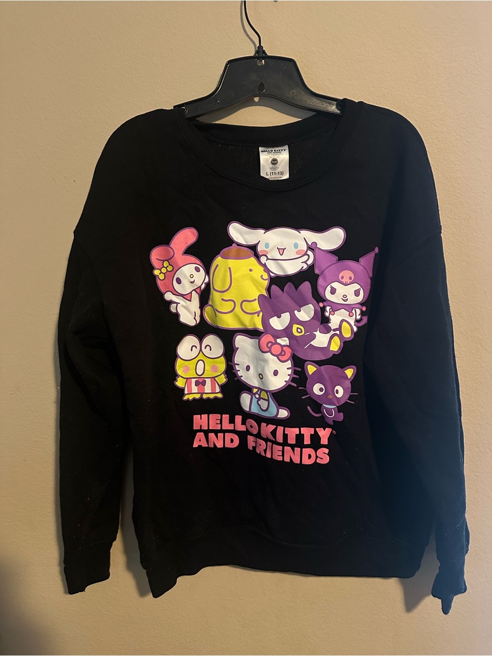 Hello Kitty Black Tee with Pastel Character Graphics